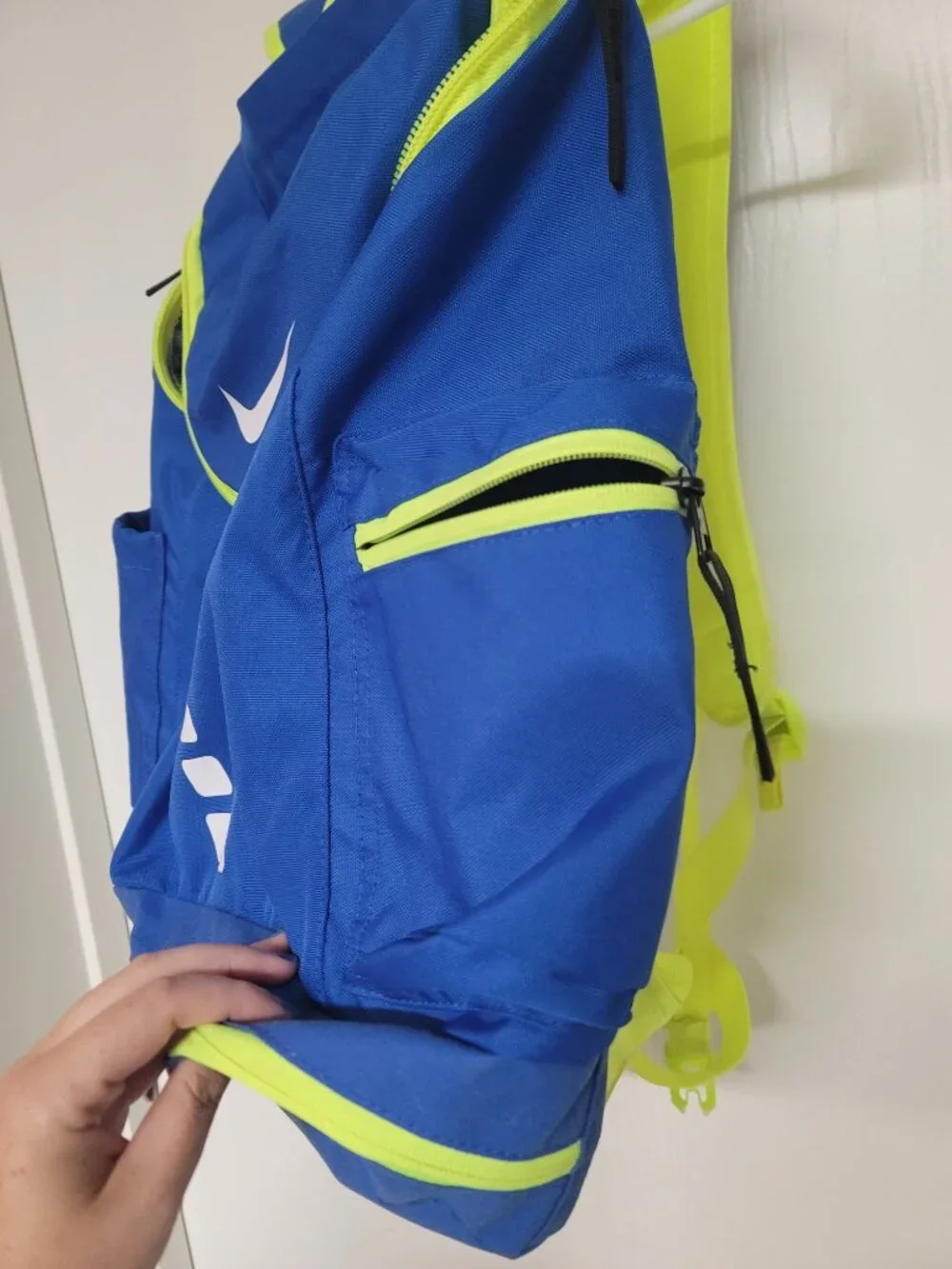 Mens neon green and blue Nike Elite backpack - slightly used but no damage